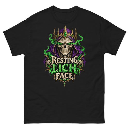 Black classic T-shirt, front view, featuring a crowned skull lich in a purple hood with glowing green eyes and green smoke above dripping green lettering that reads Resting Lich Face